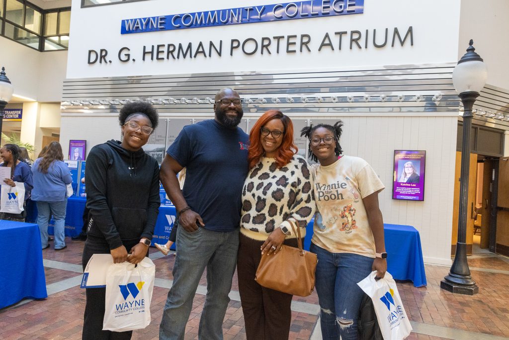 A family stands together.