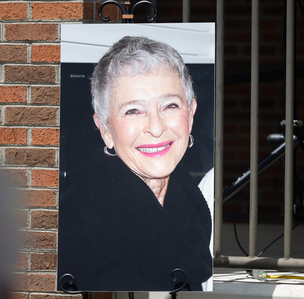 A photo of a woman is displayed.