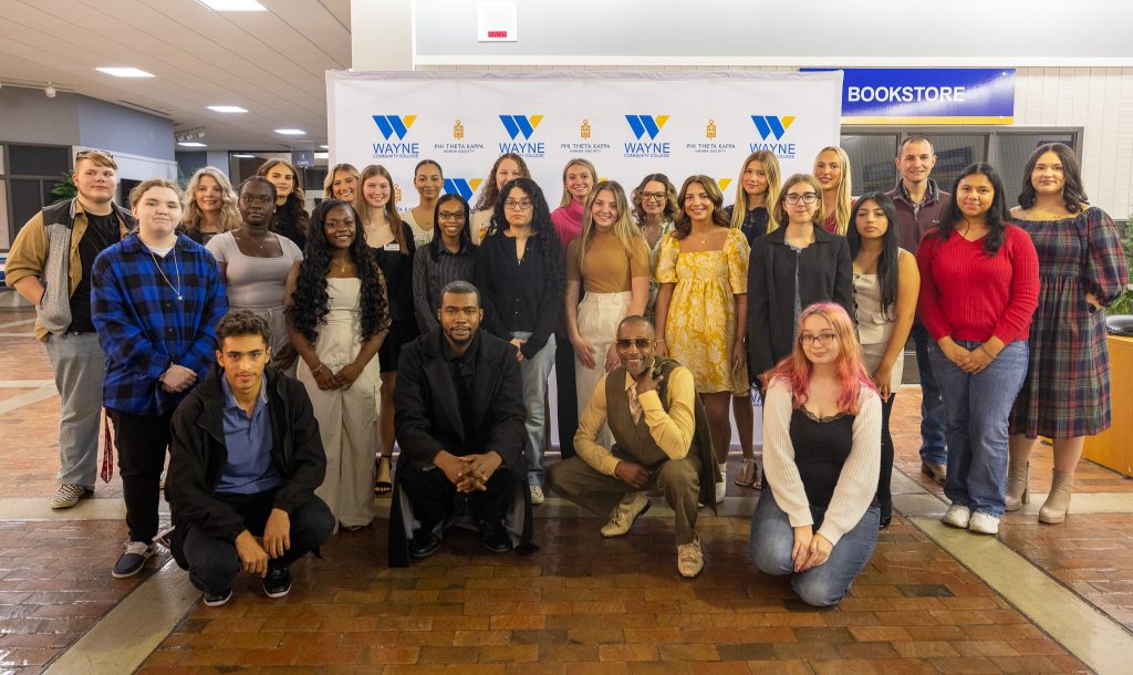 A group of students stand together.